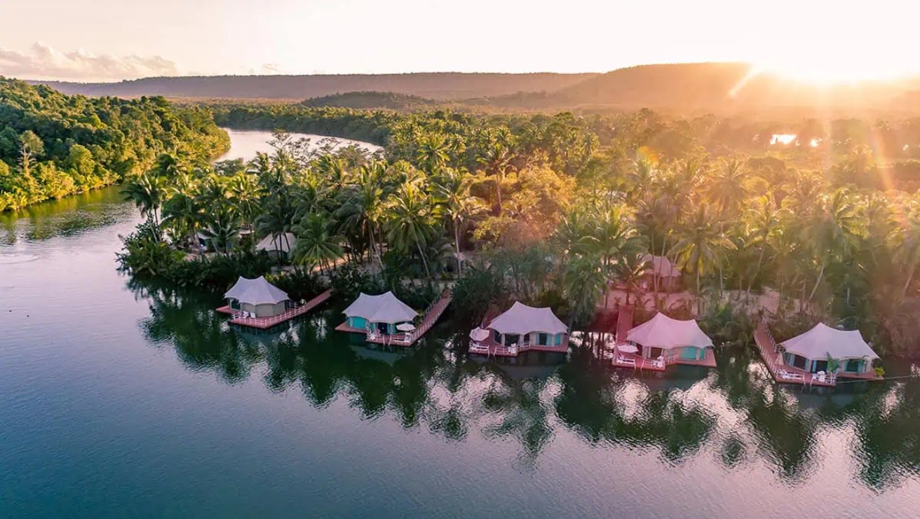Aerial view of the eco-tent villas on the river in Cambodia