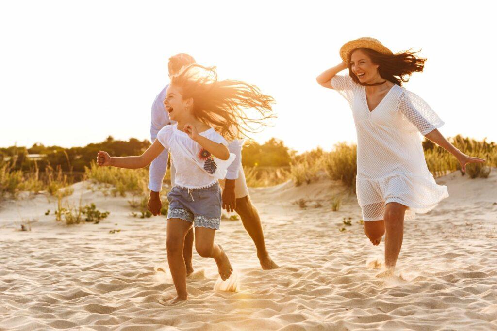 A happy, natur loving family on a beach vacation