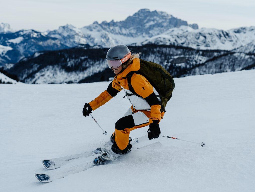 Young woman skiing in the Dolomites