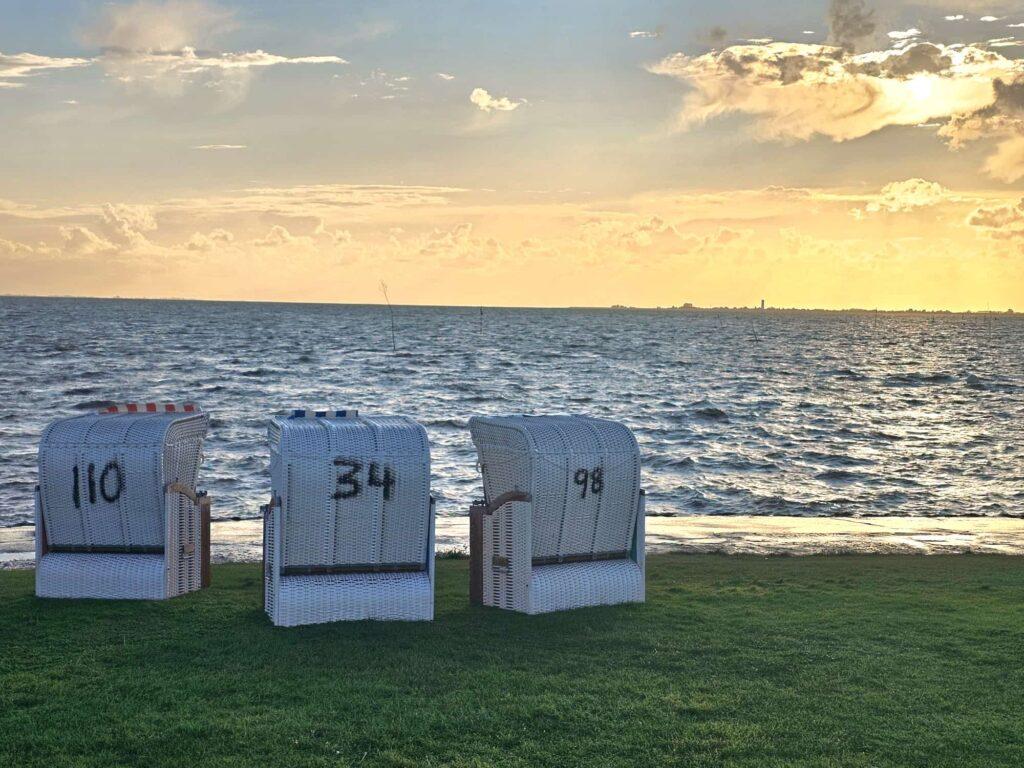 North Sea beach with three beach chairs