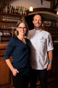 Johann Steinwender and his wife Karin at the bar of the sustainable boutique hotel Schloss Lerchenhof