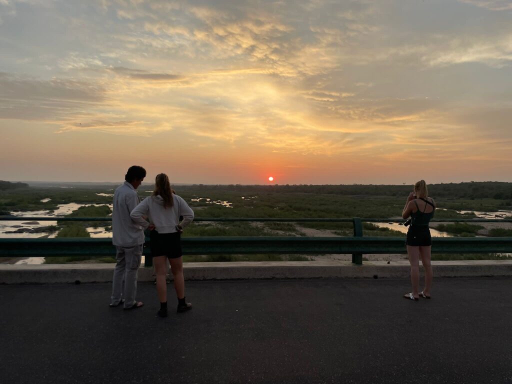 Johanna Bramman watches the sunset in Kruger National Park, South Africa