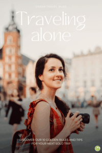 A young woman traveling alone, camera in hand, stands against a blurred cityscape with historic buildings in the background. At the top of the image, in large, decorative lettering, it reads: “Traveling Alone.” At the bottom, there is a text box listing ten golden rules or tips for solo travel.