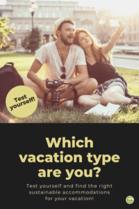 A young couple is sitting on a meadow. He is holding a camera, she is taking a selfie. 