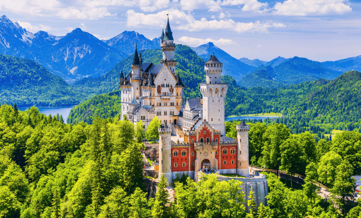 Neuschwanstein Castle under a bright blue sky