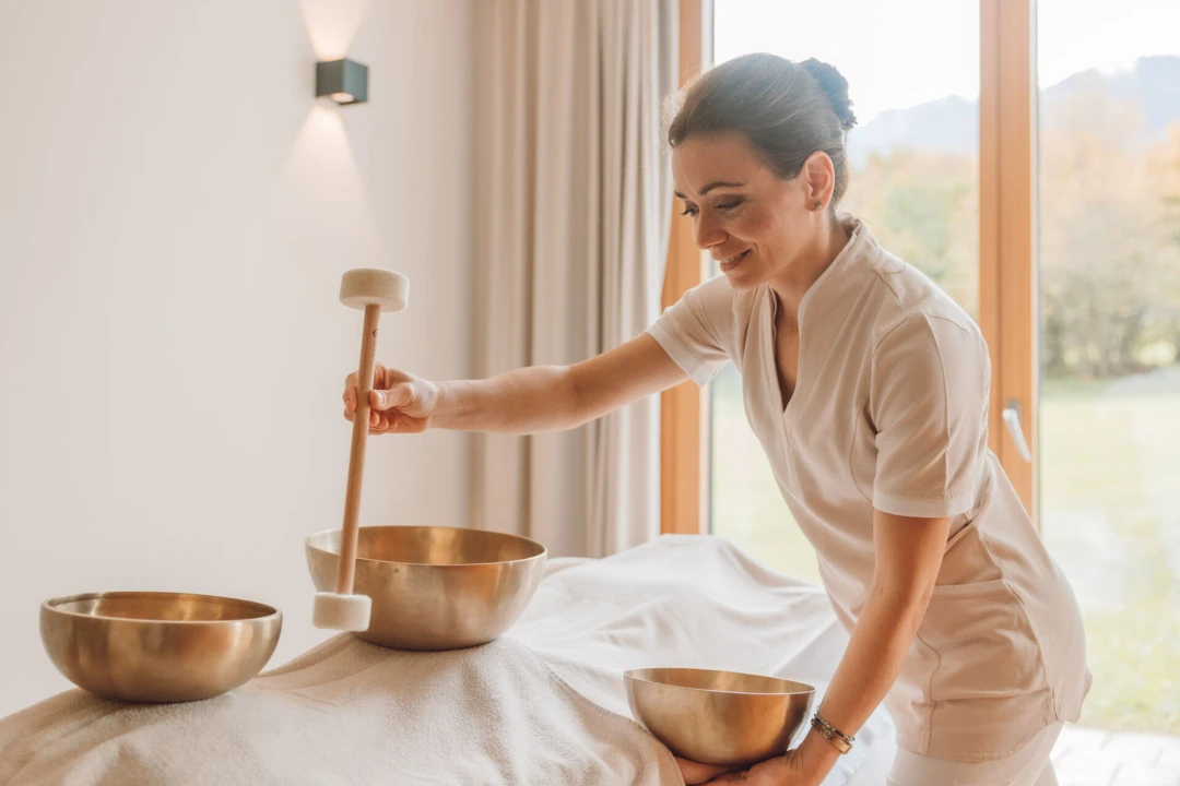 Singing bowl massage in sustainable hotels
