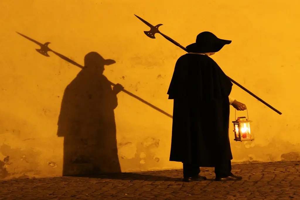 Night watchman in Bad Herrenalb walks with lantern